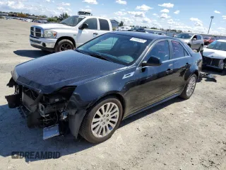 2011 Cadillac CTS Sedan Premium with VIN 1G6DP5ED2B0121611, listed as a Copart auction lot 51448415 with 111,327 mi miles and Salvage Title. Bid and sale history available at carsss.com. Image 1.
