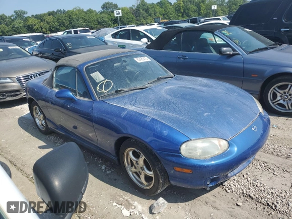 1999 Mazda MX-5 Miata with VIN JM1NB353XX0134898, listed as a Copart auction lot 63429475 with 140,595 mi miles and Clean title. Bid and sale history available at DreamBid. Image 4.
