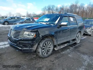 2015 Lincoln Navigator with VIN 5LMJJ2JT1FEJ03101, listed as a IAAI auction lot 41158169 with 159,249 mi miles. Bid and sale history available at carsss.com. Image 2.