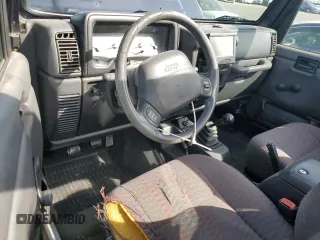 1999 Jeep Wrangler Sport with VIN 1J4FY19S0XP467587, listed as a Copart auction lot 51339415 with 168,142 mi miles and Clean Title. Bid and sale history available at carsss.com. Image 8.