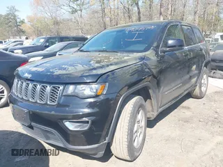 2017 Jeep Grand Cherokee Laredo with VIN 1C4RJFAG5HC793244, listed as a IAAI auction lot 41904575 with 299,722 mi miles. Bid and sale history available at carsss.com. Image 17.