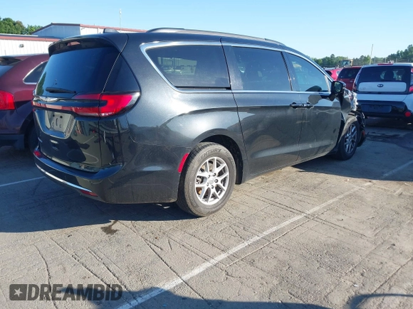 2022 Chrysler Pacifica Touring L with VIN 2C4RC1BG9NR117538, listed as a IAAI auction lot 42318518 with 103,311 mi miles and . Bid and sale history available at DreamBid. Image 4.