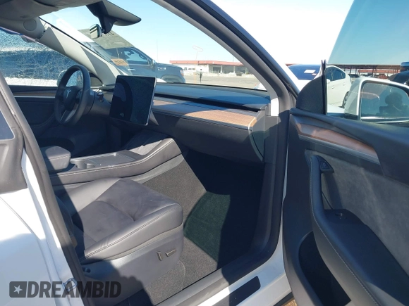 2024 Tesla Model Y Performance with VIN 7SAYGDEF4RF053711, listed as a IAAI auction lot 41836931 with 12,442 mi miles and . Bid and sale history available at DreamBid. Image 5.