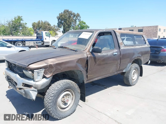 1989 Toyota Pickup DX with VIN JT4RN01PXK7010307, listed as a IAAI auction lot 42212229 with 389,623 mi miles and . Bid and sale history available at DreamBid. Image 2.