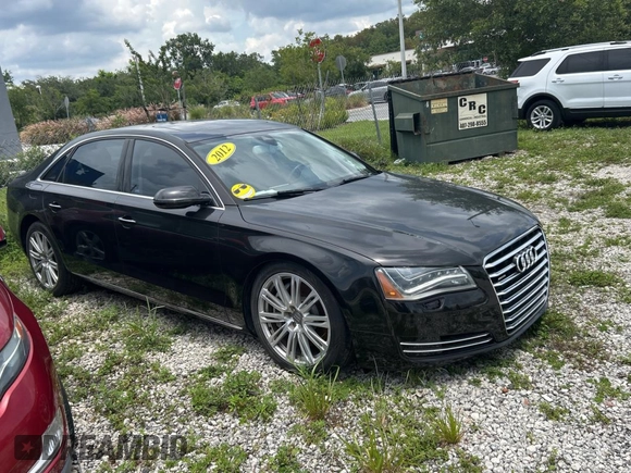 2012 Audi A8 z VIN WAURVAFD6CN015907, wystawiony jako Copart lot #59188515 z przebiegiem 112 879 mil mil oraz Czysty tytuł • Clean title. Historia ofert i sprzedaży dostępna na DreamBid. Obrazek 1.