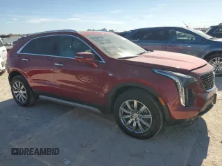 2022 Cadillac XT4 FWD Premium Luxury with VIN 1GYFZCR43NF154997, listed as a Copart auction lot 81942214 with 22,697 mi miles and Salvage title. Bid and sale history available at DreamBid. Image 4.