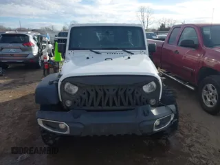 2017 Jeep Wrangler Unlimited Sport with VIN 1C4BJWDG2HL721379, listed as a IAAI auction lot 41314767 with 174,228 mi miles. Bid and sale history available at carsss.com. Image 12.