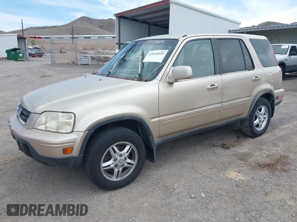 2000 Honda CR-V SE with VIN JHLRD1874YC046995, listed as a IAAI auction lot 42033059 with 218,484 mi miles. Bid and sale history available at carsss.com. Image 2.