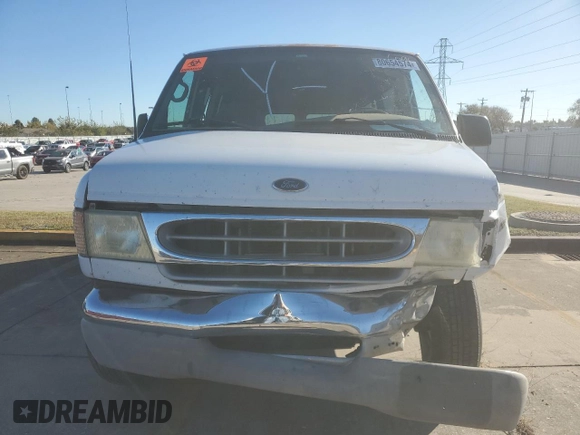 2002 Ford Econoline Passenger XL with VIN 1FBSS31S82HB36096, listed as a Copart auction lot 80654574 with 170,656 mi miles and Salvage title. Bid and sale history available at DreamBid. Image 5.