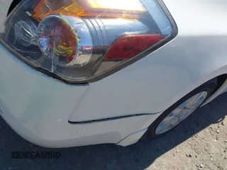 2012 Nissan Altima S z VIN 1N4AL2AP6CC170813, wystawiony jako IAAI lot #41857682 z przebiegiem 102 577 mil mil oraz . Historia ofert i sprzedaży dostępna na DreamBid. Obrazek 12.