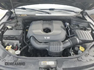 2014 Jeep Grand Cherokee Laredo with VIN 1C4RJFAG4EC486790, listed as a Copart auction lot 55314735 with 143,096 mi miles and Salvage Title. Bid and sale history available at DreamBid. Image 12.