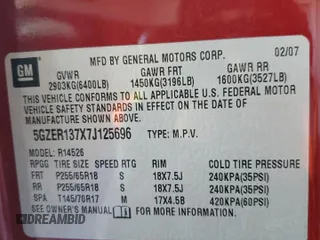 2007 Saturn Outlook XE z VIN 5GZER137X7J125696, wystawiony jako Copart lot #83236444 z przebiegiem Nie podano mil oraz Szkoda całkowita • Salvage title. Historia ofert i sprzedaży dostępna na DreamBid. Obrazek 13.