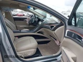 2016 Lincoln MKZ with VIN 3LN6L2G90GR631161, listed as a IAAI auction lot 42063610 with 63,336 mi miles. Bid and sale history available at carsss.com. Image 5.