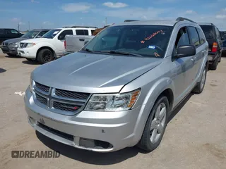 2014 Dodge Journey SE with VIN 3C4PDCAB0ET284437, listed as a IAAI auction lot 42063601 with 206,913 mi miles and . Bid and sale history available at carsss.com. Image 2.