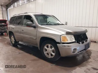 2003 GMC Envoy SLE z VIN 1GKDT13S432299338, wystawiony jako IAAI lot #41443555 z przebiegiem 161 918 mil mil oraz . Historia ofert i sprzedaży dostępna na DreamBid. Obrazek 1.