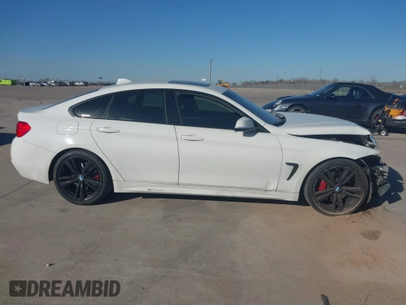 2015 BMW 4 Series 435i with VIN WBA4B1C59FD955497, listed as a IAAI auction lot 41174096 with 101,047 mi miles and . Bid and sale history available at carsss.com. Image 13.