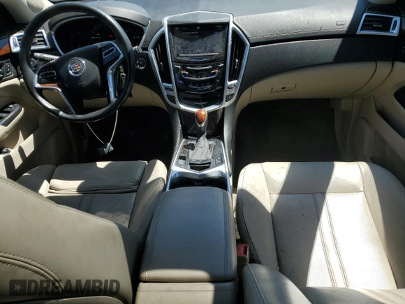 2013 Cadillac SRX Performance Collection z VIN 3GYFNHE37DS519391, wystawiony jako Copart lot #56307695 z przebiegiem 122 294 mil mil oraz Czysty tytuł • Clean title. Historia ofert i sprzedaży dostępna na DreamBid. Obrazek 8.