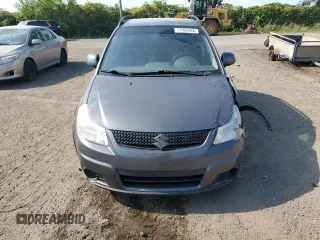 2010 Suzuki SX4 with VIN JS2YB5A24A6300249, listed as a Copart auction lot 71565394 with 291,886 mi miles and Salvage Title. Bid and sale history available at DreamBid. Image 5.