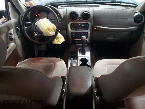 2004 Jeep Liberty Sport with VIN 1J4GK48K04W127981, listed as a Copart auction lot 51804135 with 166,710 mi miles and Salvage Title. Bid and sale history available at DreamBid. Image 8.