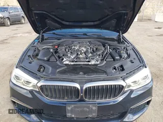 2018 BMW 5 Series M550i xDrive with VIN WBAJB9C52JB035930, listed as a IAAI auction lot 41674415 with 56,294 mi miles and . Bid and sale history available at DreamBid. Image 10.