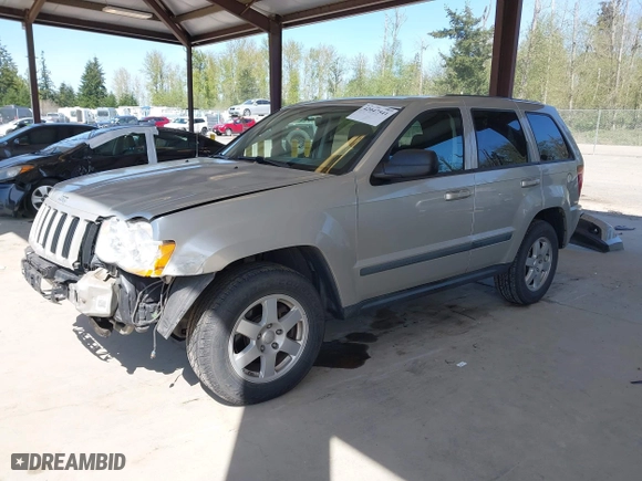 2008 Jeep Grand Cherokee Laredo with VIN 1J8GR48K18C222454, listed as a IAAI auction lot 42047541 with 180,145 mi miles. Bid and sale history available at carsss.com. Image 18.