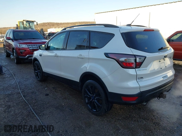 2017 Ford Escape Titanium with VIN 1FMCU9J93HUE96611, listed as a IAAI auction lot 41546906 with 90,586 mi miles. Bid and sale history available at carsss.com. Image 3.