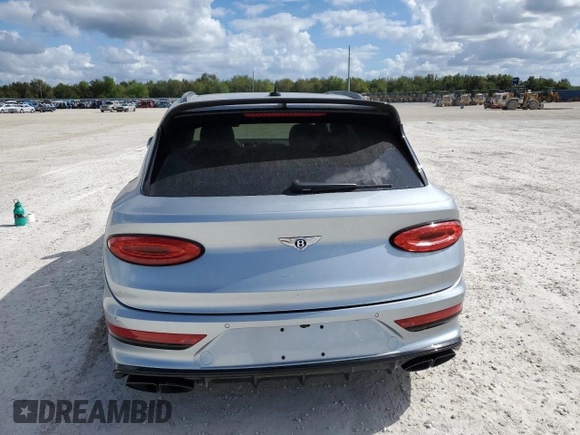 2022 Bentley Bentayga V8 z VIN SJAAM2ZV9NC011752, wystawiony jako Copart lot #79142714 z przebiegiem Nie podano mil oraz Nie do naprawy. Historia ofert i sprzedaży dostępna na DreamBid. Obrazek 6.