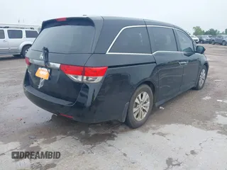2014 Honda Odyssey EX-L with VIN 5FNRL5H64EB114709, listed as a IAAI auction lot 42131146 with 145,616 mi miles and . Bid and sale history available at DreamBid. Image 4.