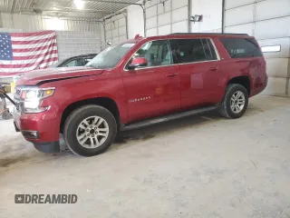 2015 Chevrolet Suburban LT with VIN 1GNSKJKC7FR660497, listed as a Copart auction lot 50402855 with 166,822 mi miles and Salvage Title. Bid and sale history available at carsss.com. Image 1.