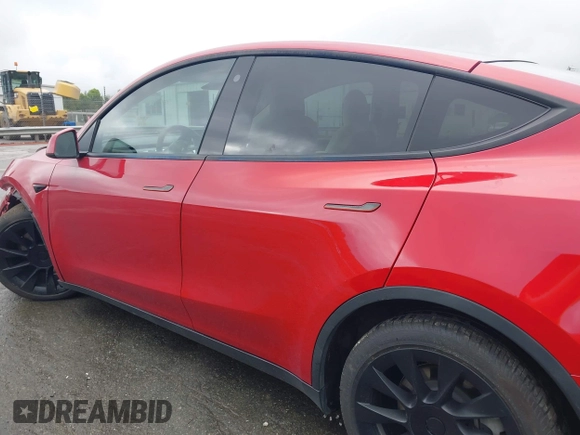 2021 Tesla Model Y Long Range with VIN 5YJYGDEE5MF085032, listed as a IAAI auction lot 41982925 with 64,541 mi miles and . Bid and sale history available at DreamBid. Image 14.