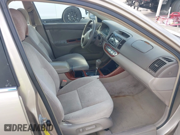 2003 Toyota Camry LE with VIN 4T1BE30K83U176834, listed as a IAAI auction lot 41307922 with 182,019 mi miles and . Bid and sale history available at DreamBid. Image 5.