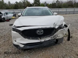 2021 Mazda CX-5 Grand Touring with VIN JM3KFBDM2M1436789, listed as a Copart auction lot 49534305 with 65,790 mi miles and Salvage Title. Bid and sale history available at carsss.com. Image 5.