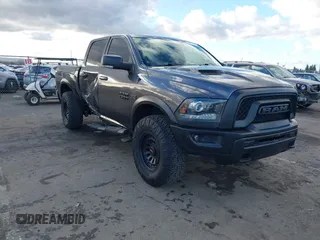 2017 Ram 1500 Rebel z VIN 1C6RR7YT2HS734120, wystawiony jako IAAI lot #41590424 z przebiegiem 113 034 mil mil oraz . Historia ofert i sprzedaży dostępna na DreamBid. Obrazek 1.