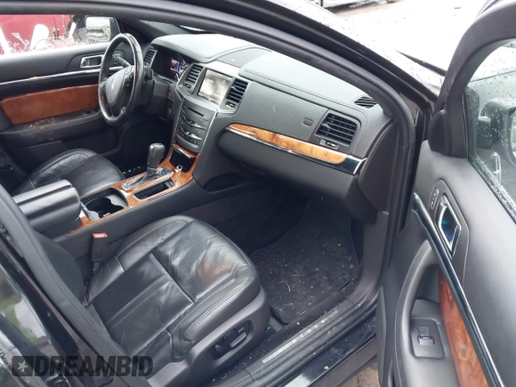 2014 Lincoln MKS with VIN 1LNHL9EK3EG601471, listed as a IAAI auction lot 41142126 with 110,432 mi miles. Bid and sale history available at carsss.com. Image 5.