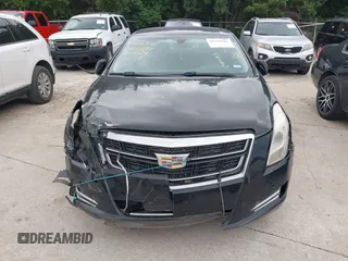 2017 Cadillac XTS Luxury z VIN 2G61M5S32H9158776, wystawiony jako IAAI lot #42528442 z przebiegiem 90 680 mil mil oraz . Historia ofert i sprzedaży dostępna na DreamBid. Obrazek 11.