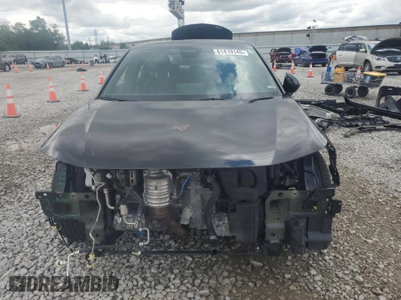 2023 Honda Civic Sport with VIN 2HGFE2F56PH570926, listed as a Copart auction lot 61419145 with 35,014 mi miles and Salvage title. Bid and sale history available at DreamBid. Image 5.