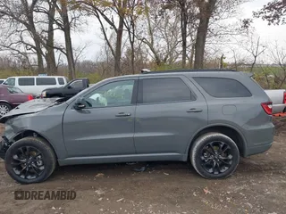 2022 Dodge Durango GT Plus z VIN 1C4RDJDG9NC187642, wystawiony jako IAAI lot #40886210 z przebiegiem 39 006 mil mil oraz . Historia ofert i sprzedaży dostępna na DreamBid. Obrazek 14.