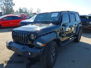 2023 Jeep Wrangler Willys with VIN 1C4HJXDN0PW597768, listed as a IAAI auction lot 41645815 with 23,717 mi miles and . Bid and sale history available at DreamBid. Image 18.