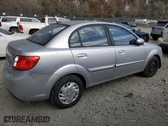 2010 Kia Rio LX with VIN KNADH4A38A6627955, listed as a Copart auction lot 43702265 with 138,005 mi miles and Non Repairable. Bid and sale history available at carsss.com. Image 3.