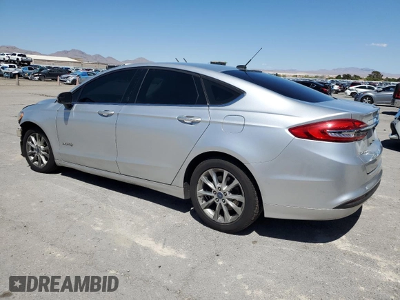 2017 Ford Fusion Hybrid SE with VIN 3FA6P0LUXHR266132, listed as a Copart auction lot 56255565 with 182,458 mi miles and Salvage title. Bid and sale history available at DreamBid. Image 2.