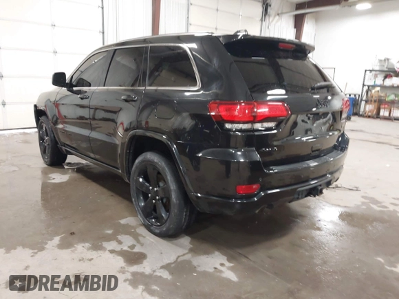 2015 Jeep Grand Cherokee Laredo with VIN 1C4RJFAG3FC115444, listed as a IAAI auction lot 41248211 with 138,828 mi miles. Bid and sale history available at carsss.com. Image 3.