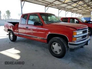 1997 Chevrolet Silverado 1500 with VIN 1GCEK19R1VE137711, listed as a Copart auction lot 50542465 with 297,338 mi miles and Salvage Title. Bid and sale history available at DreamBid. Image 4.