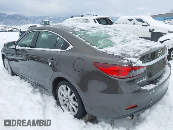 2016 Mazda Mazda6 i Touring with VIN JM1GJ1V58G1458699, listed as a IAAI auction lot 41598598 with 73,576 mi miles. Bid and sale history available at carsss.com. Image 3.