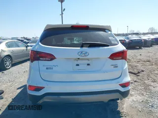 2017 Hyundai Santa Fe 2.4L z VIN 5NMZTDLB3HH003991, wystawiony jako IAAI lot #42051238 z przebiegiem 125 742 mil mil oraz . Historia ofert i sprzedaży dostępna na DreamBid. Obrazek 16.