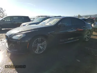 2015 BMW M6 z VIN WBS6C9C52FD468027, wystawiony jako Copart lot #85703214 z przebiegiem 91 130 mil mil oraz Szkody całkowita. Historia ofert i sprzedaży dostępna na DreamBid. Obrazek 1.