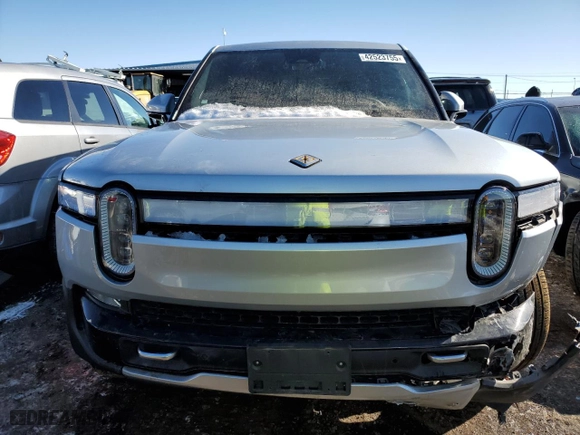 2023 Rivian R1T Adventure with VIN 7FCTGAAA5PN017311, listed as a Copart auction lot 42523755 with 35,039 mi miles and Salvage Title. Bid and sale history available at carsss.com. Image 5.