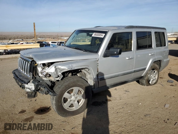 2008 Jeep Commander Sport z VIN 1J8HH48KX8C105432, wystawiony jako Copart lot #86000854 z przebiegiem 201 869 mil mil oraz Szkoda całkowita • Salvage title. Historia ofert i sprzedaży dostępna na DreamBid. Obrazek 1.