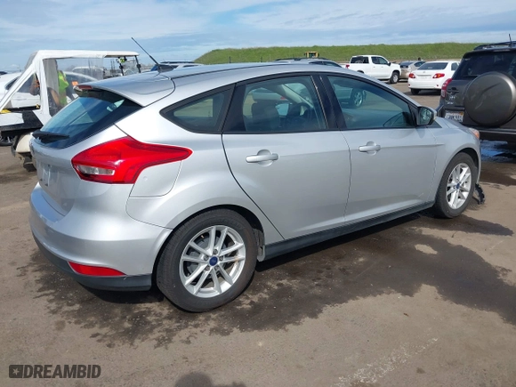 2016 Ford Focus SE with VIN 1FADP3K24GL254645, listed as a IAAI auction lot 41725276 with 117,645 mi miles. Bid and sale history available at carsss.com. Image 4.
