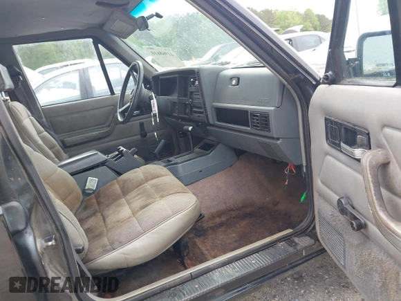 1994 Jeep Cherokee Sport with VIN 1J4FJ68S1RL160023, listed as a IAAI auction lot 41968610 with 255,978 mi miles. Bid and sale history available at carsss.com. Image 5.