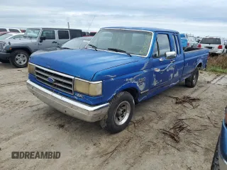1990 Ford F-150 with VIN 1FTEX15H1LKA23611, listed as a Copart auction lot 74855974 with 64,470 mi miles and Non Repairable. Bid and sale history available at carsss.com. Image 1.